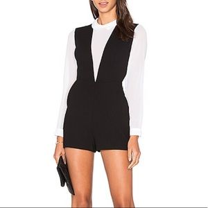 BCBGeneration Deep V Romper in Black